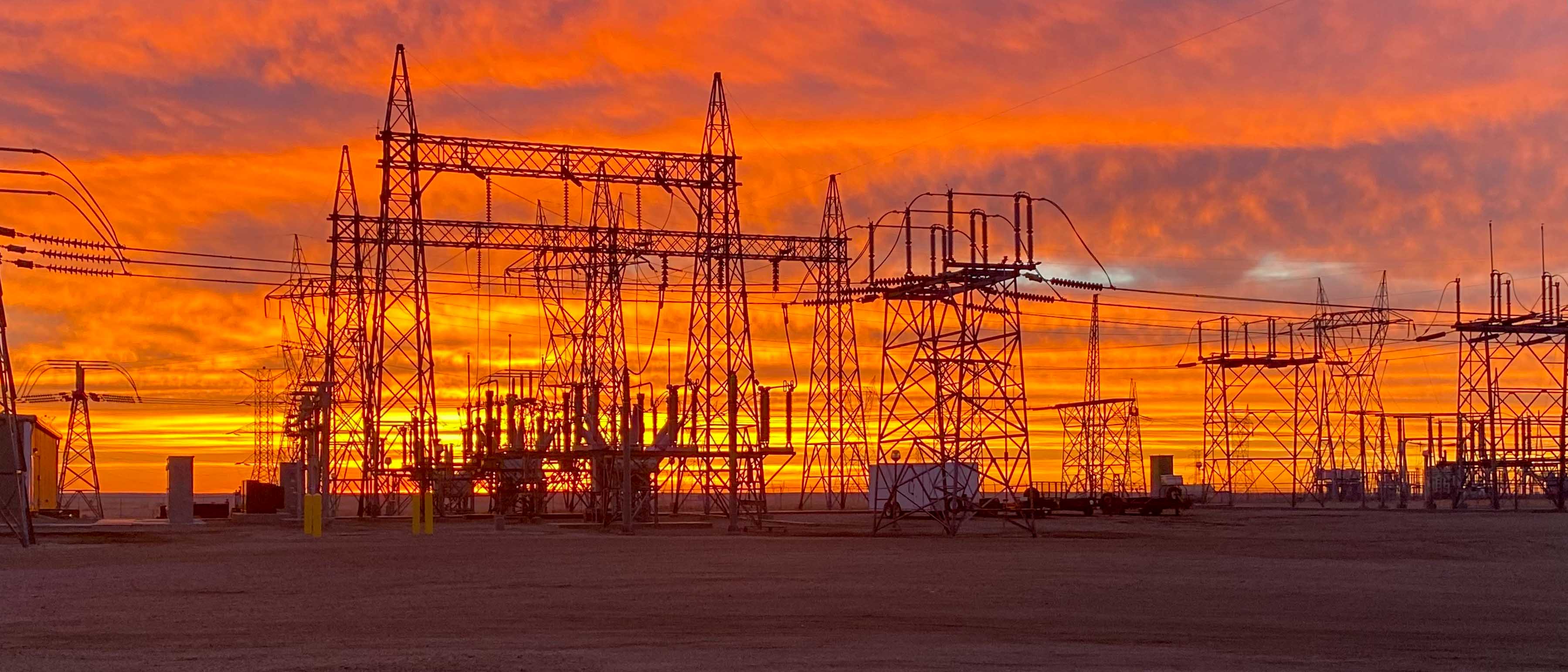 Electrical utility substation at sunset